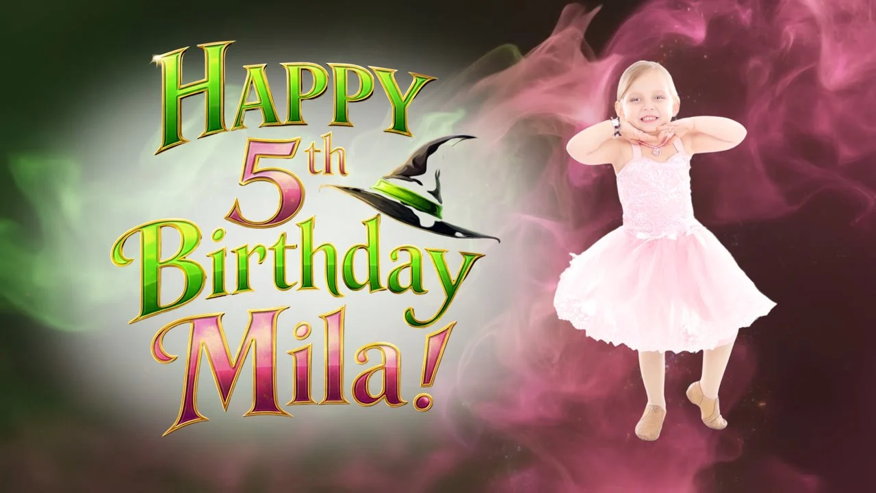 Wicked themed birthday backdrop with emerald and pink smoke and the birthday child in a pink tutu