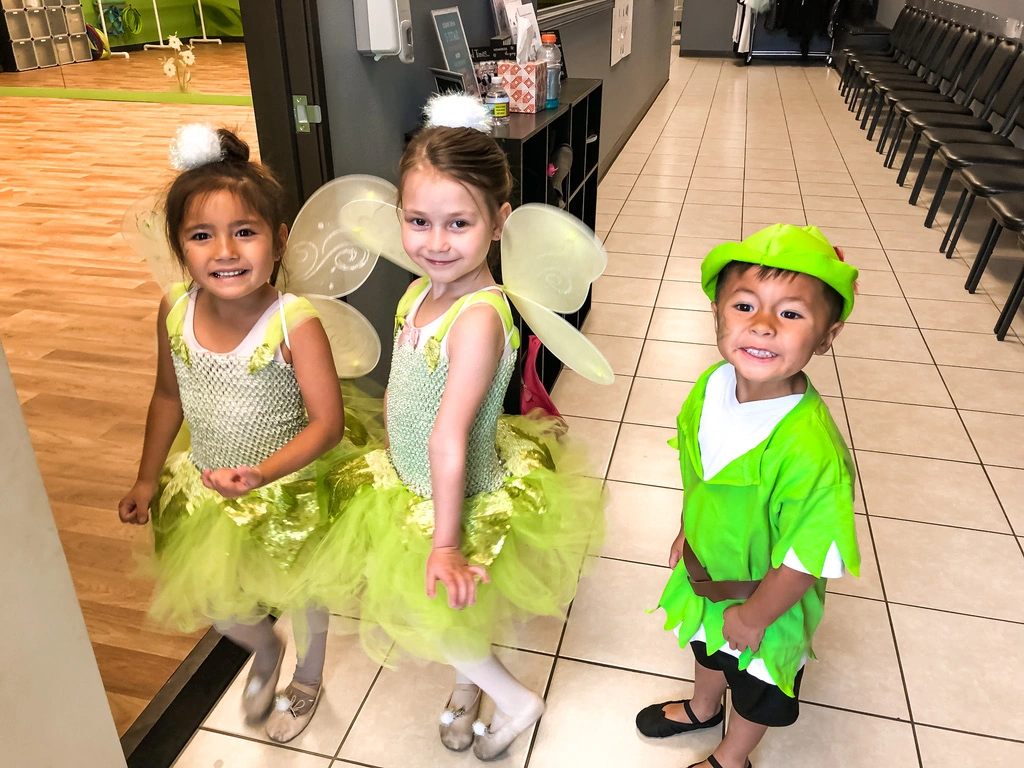Summer campers dressed as Tinker Bell fairies and Peter Pan