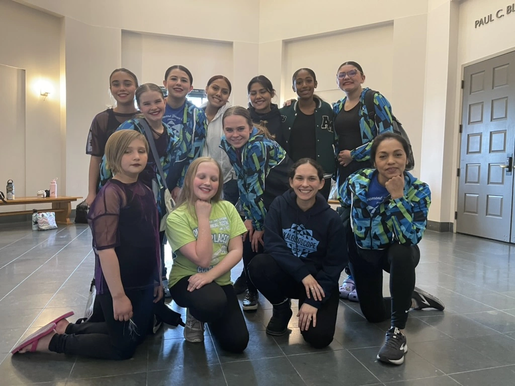 The Movement Dance Company team together at a dance event