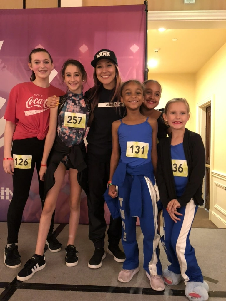Early Movement Dance Company dancers with their teacher at a Velocity dance convention