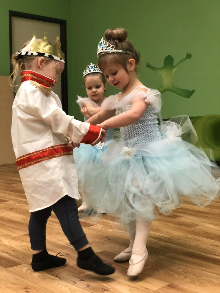 A little Cinderella dancing with her prince