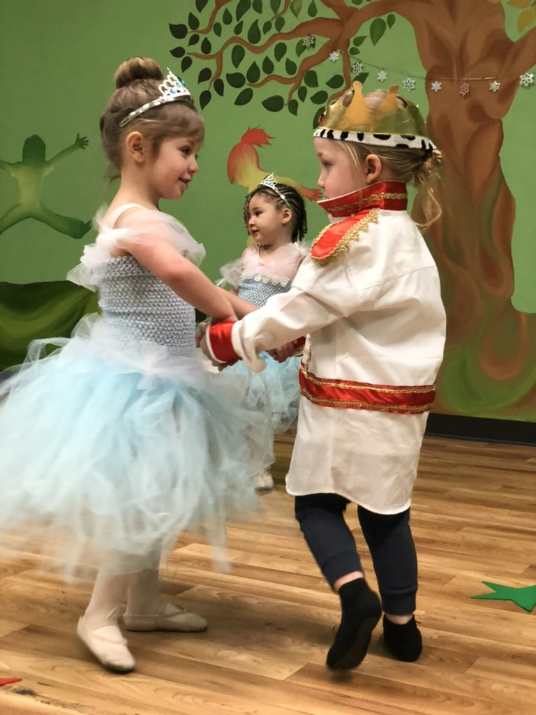 A little prince and princess waltzing in Once Upon a Ballet