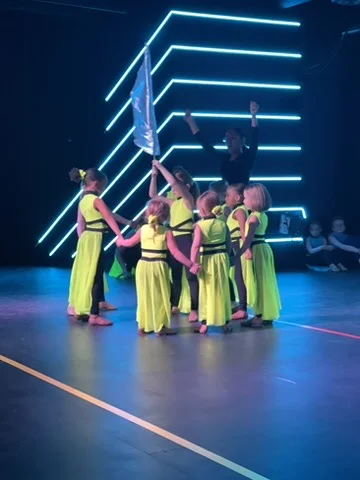 Company dancers performing on stage